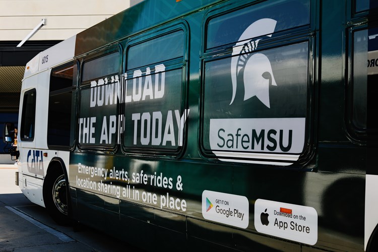 CATA bus with SafeMSU App advertisement on outside